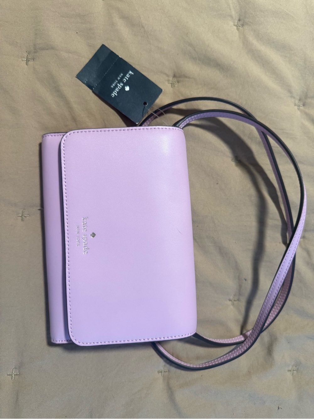 kate spade pastel lilac leather crossbody with gold logo